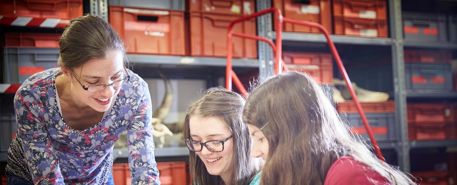 Students laughing while taking part in a group session